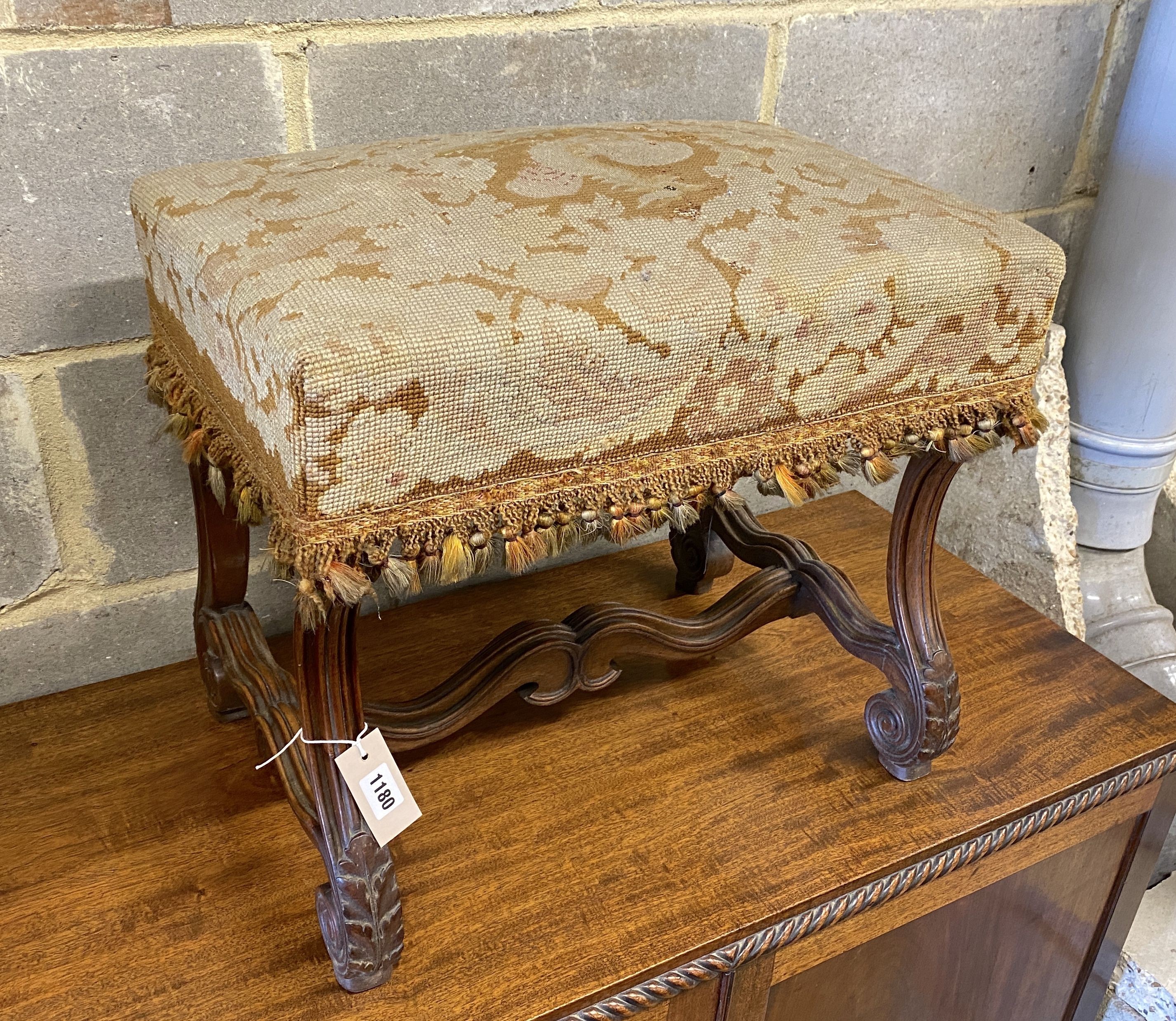 An upholstered 'X' frame stool, length 54cm, depth 36cm, height 47cm